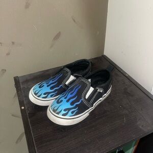 Vans Kids Black Slip-On Sneakers with Blue Flames